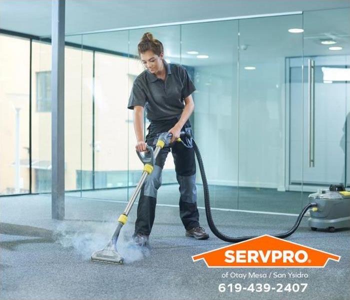 Commercial carpeting is being professionally cleaned. 